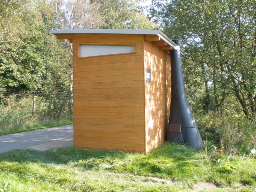 Waterless composting toilets